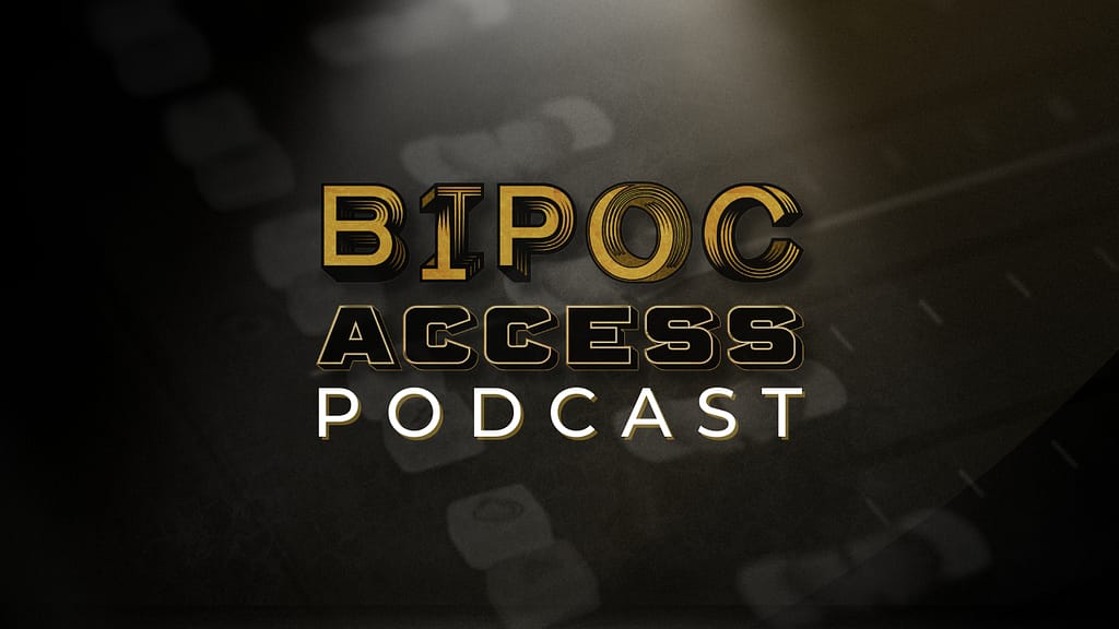 Feature image on wall showcasing 'BIPOC Access' logo with a spotlight illuminating the artwork